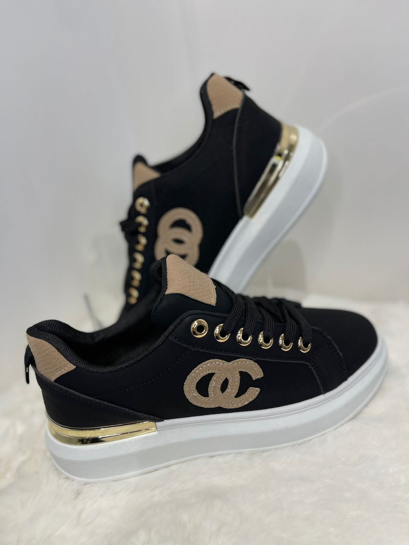 CC detail black and sand trainer