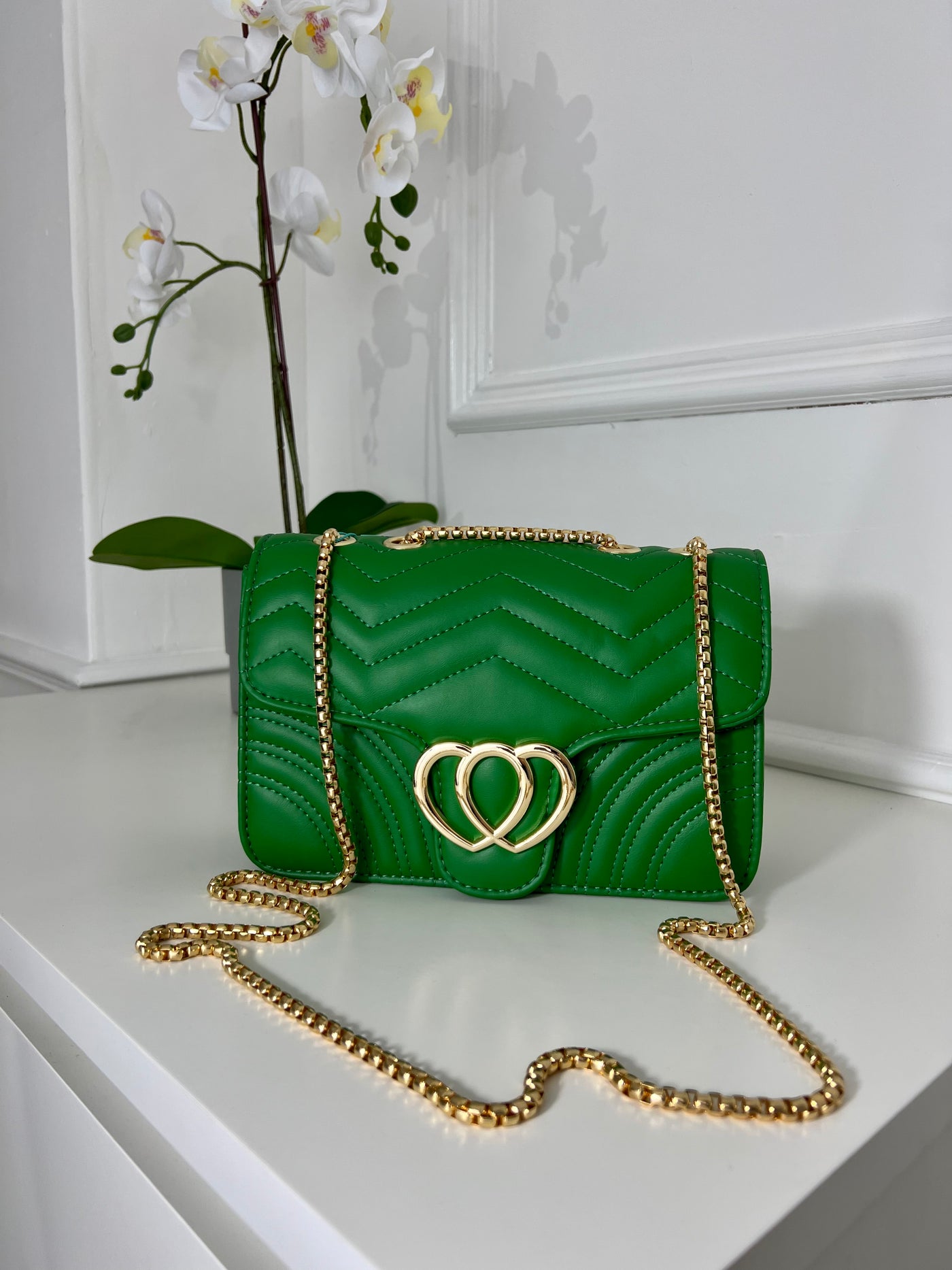 Green embraided heart buckle cross bag