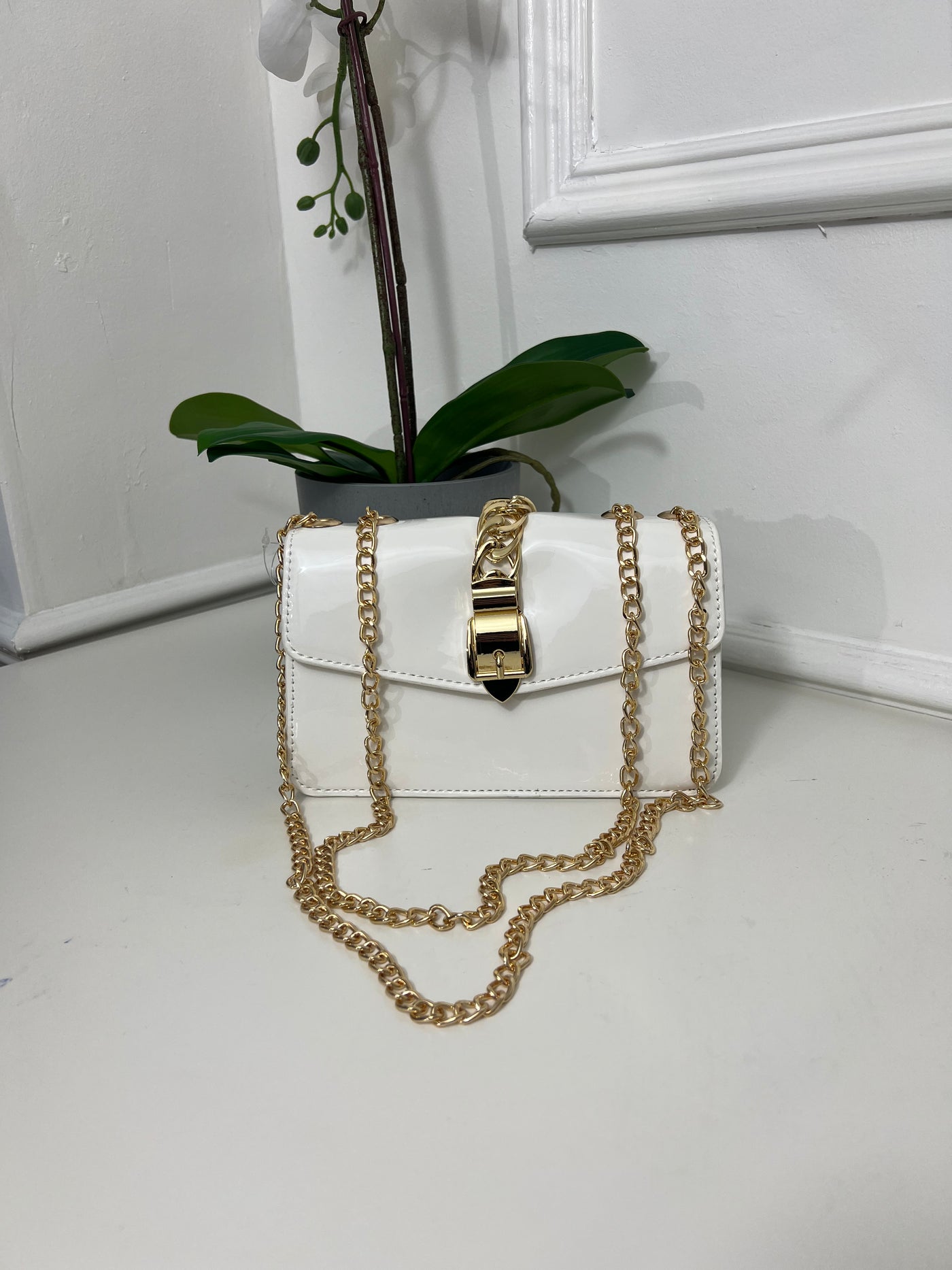 White PV gold chain with belt buckle small bag