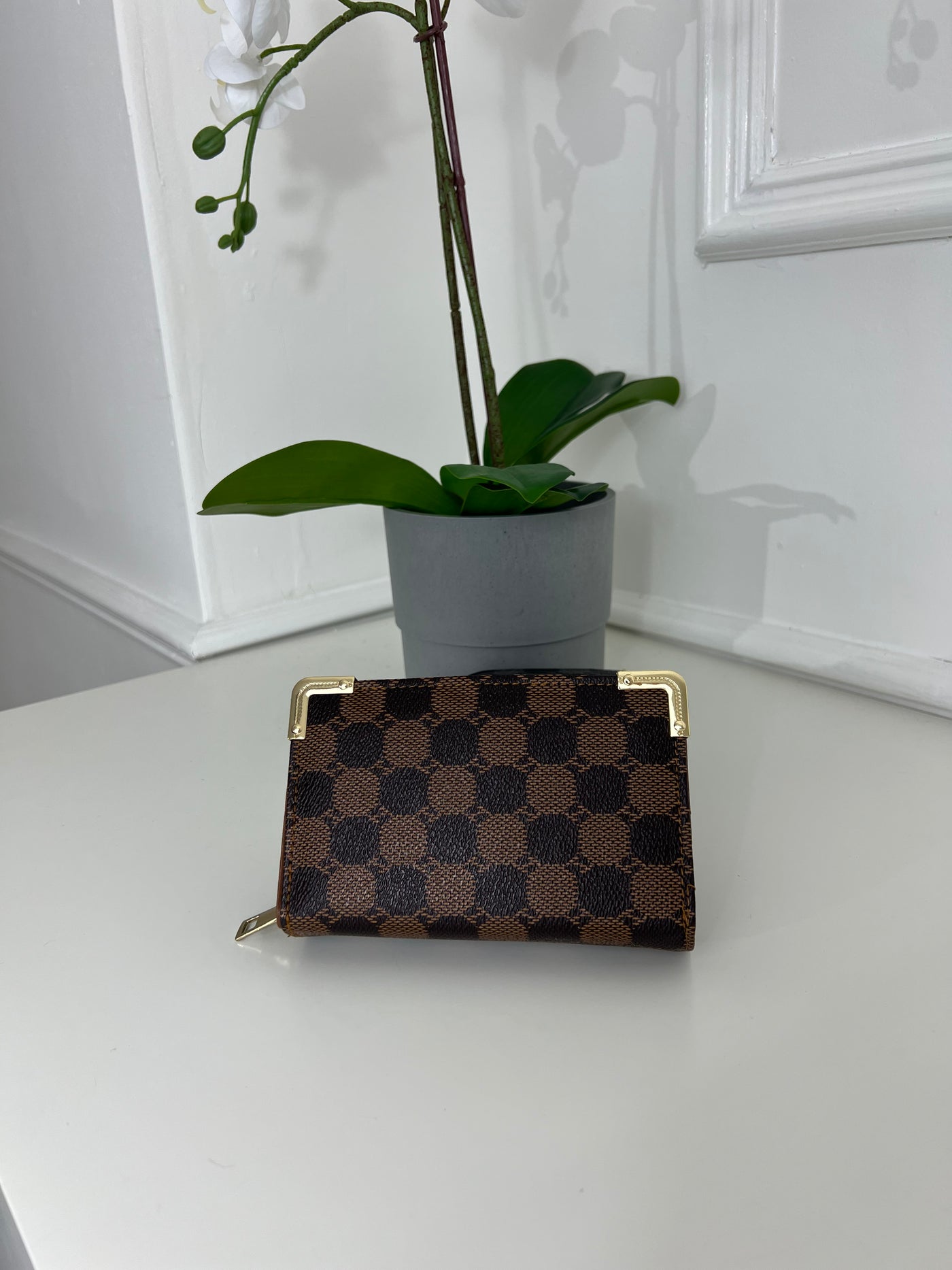 Brown dotted pattern purse