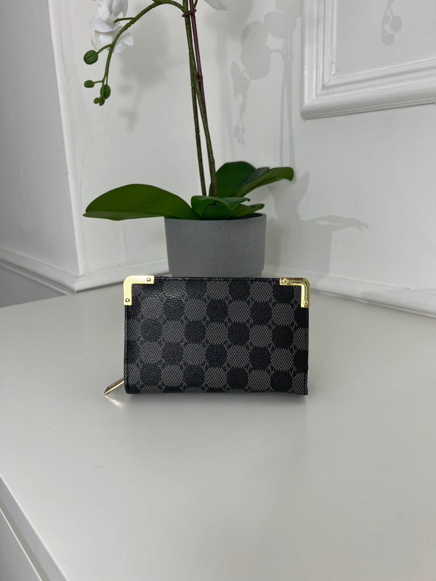 Black dotted pattern purse