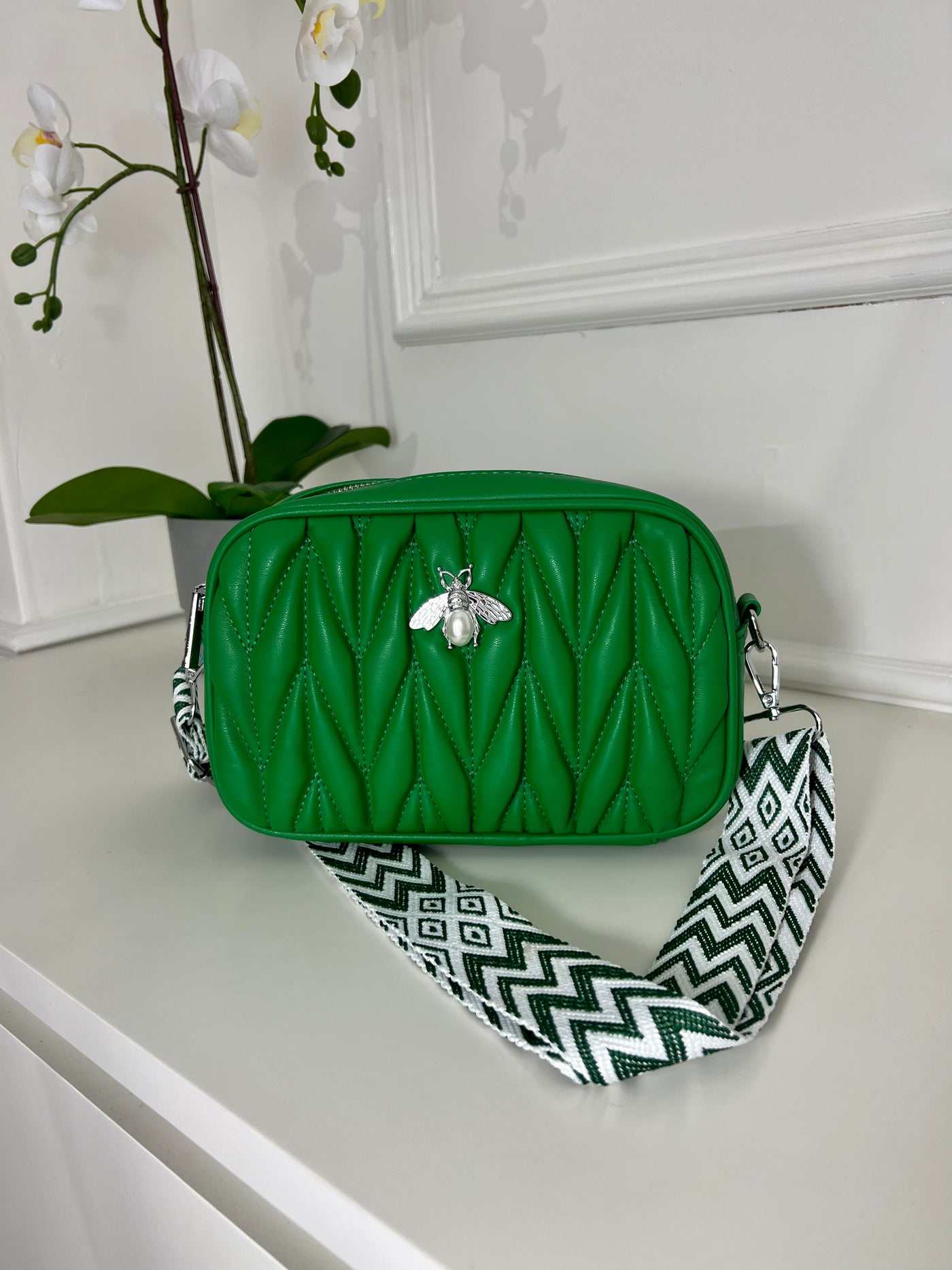 Green quilted pattern strap bag