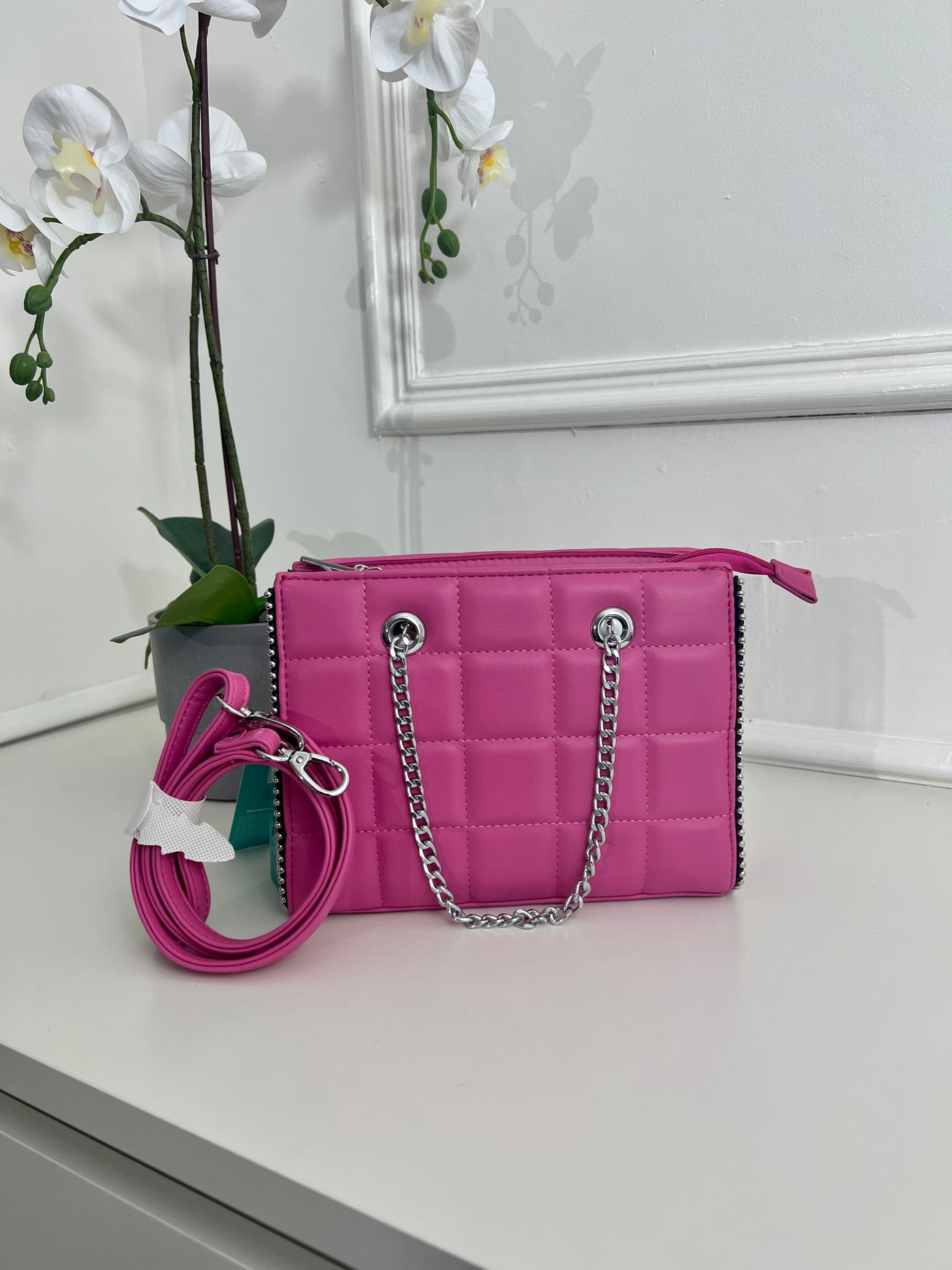 PINK QUILTED HANDBAG WITH CHAIN HANDELS AND LEATHER STRAP BAG