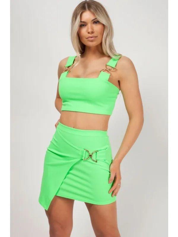 green two piece gold buckle skirt and crop