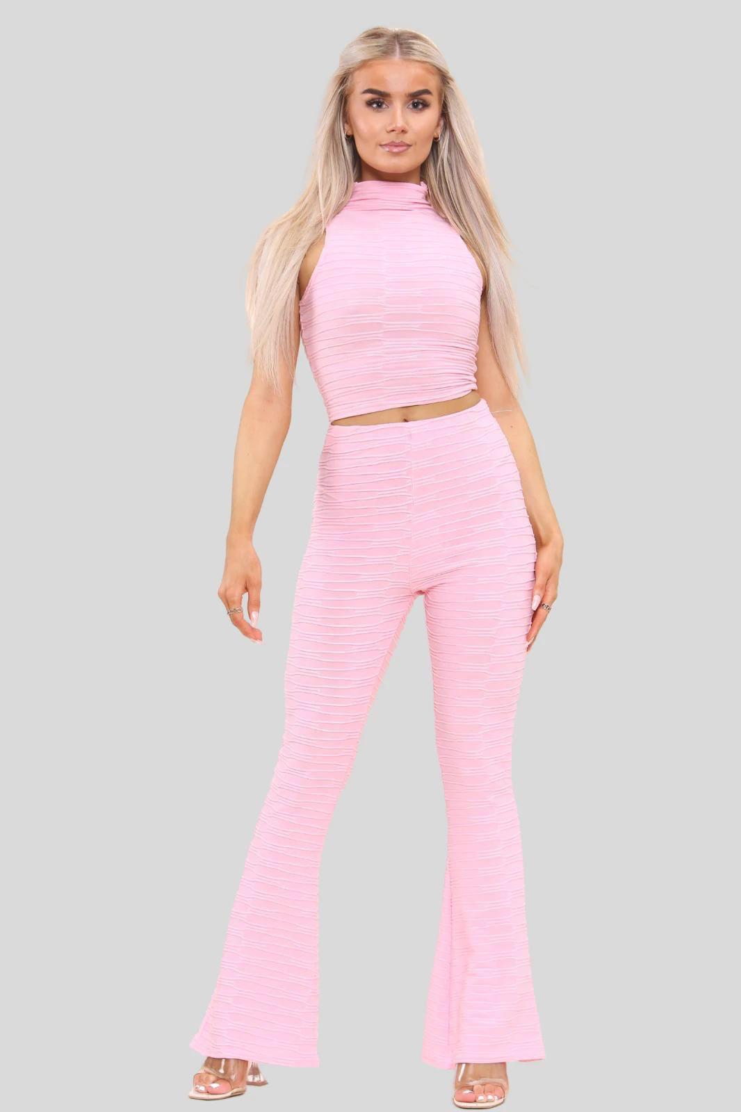 Pink Ribbed two piece flare trousers and crop top