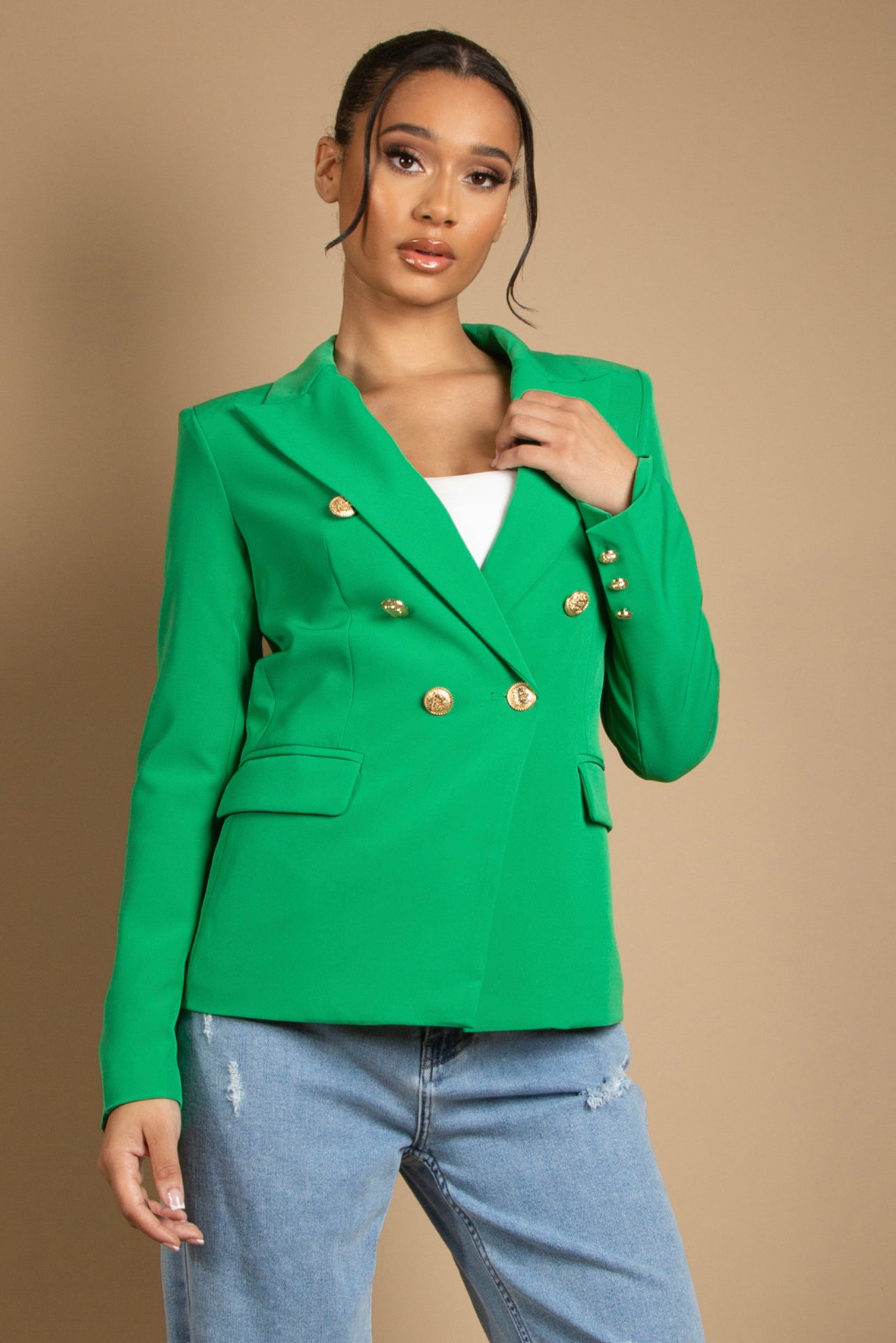 Green double-breasted tailored blazer with gold buttons