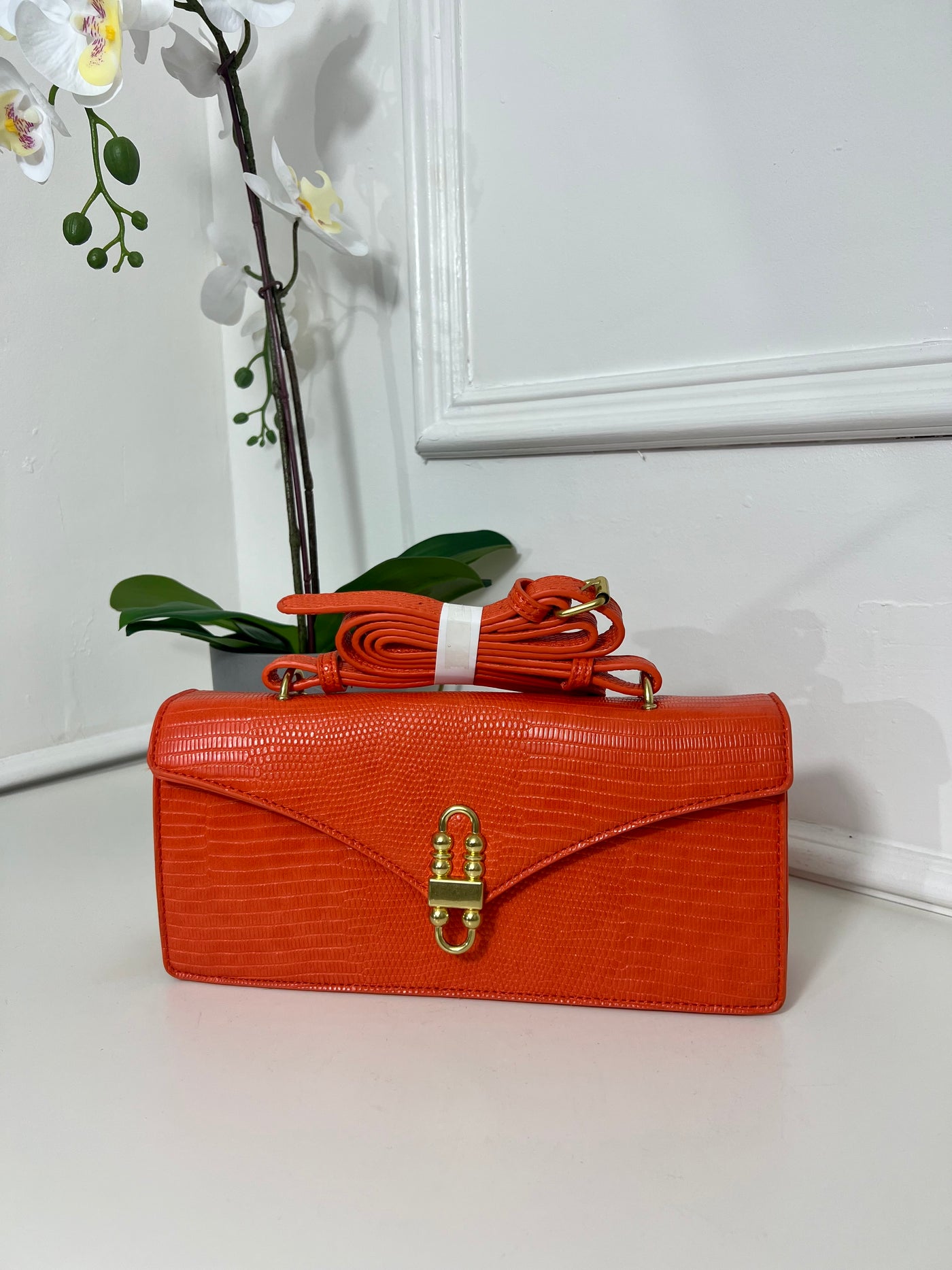 Orange rectangle cross body bag