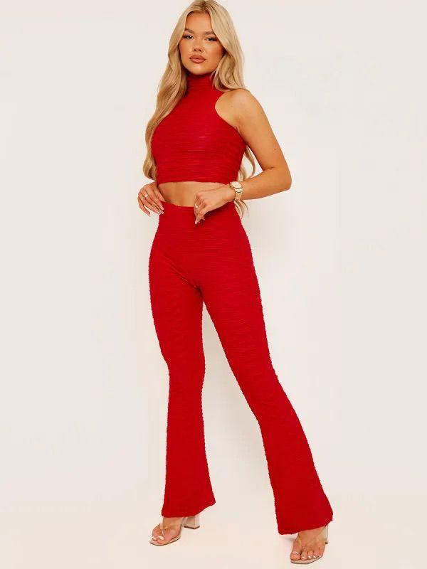 Red Ribbed two piece flare trousers and crop top