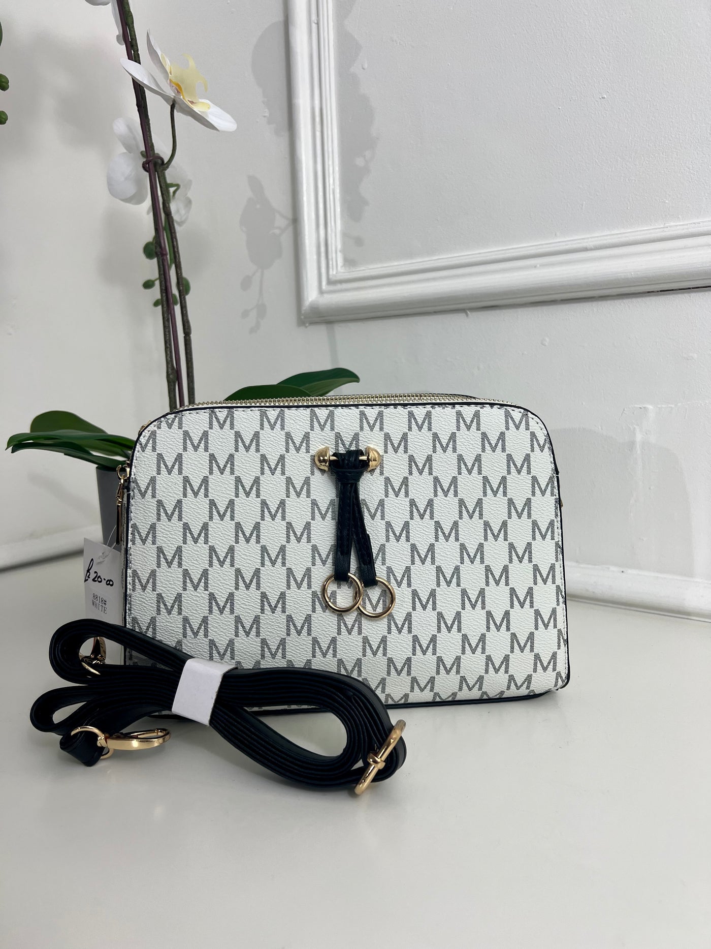 White M design cross body bag