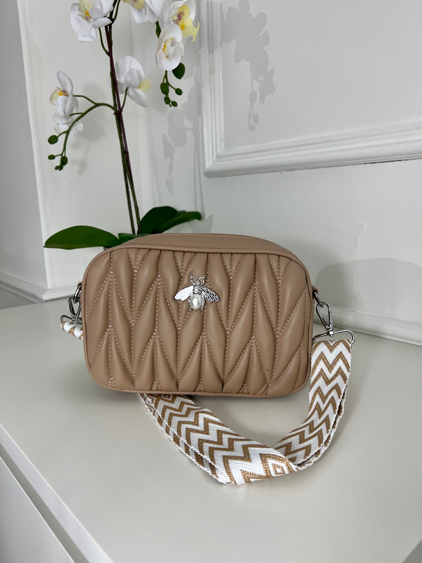 Nude quilted pattern strap bag