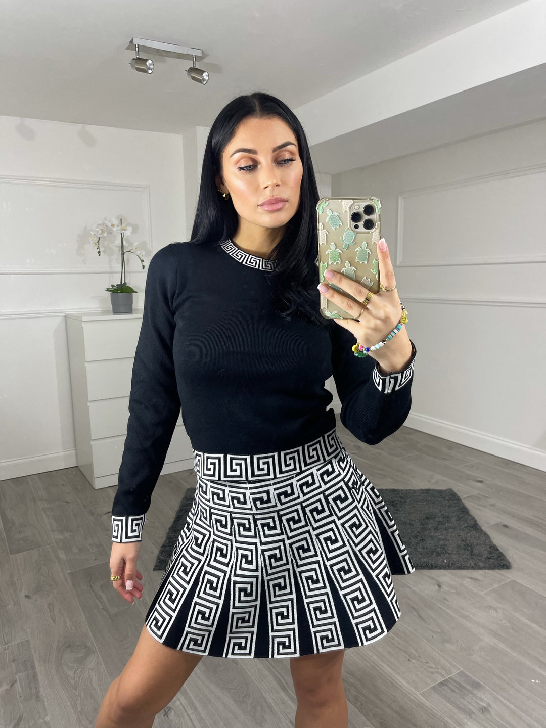 Black white knitted coord pleated skirt cropped jumper Looking Good Boutique