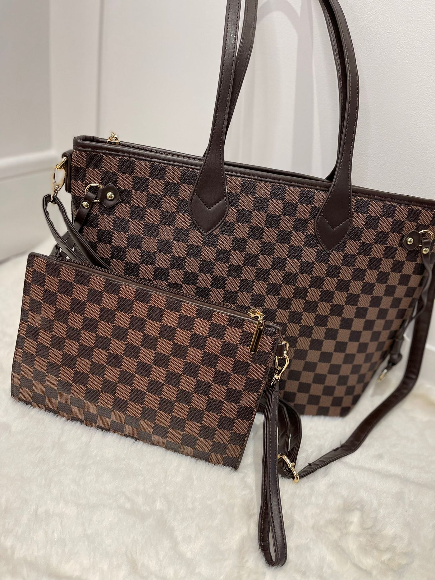Brown check shoulder bag and a small clutch