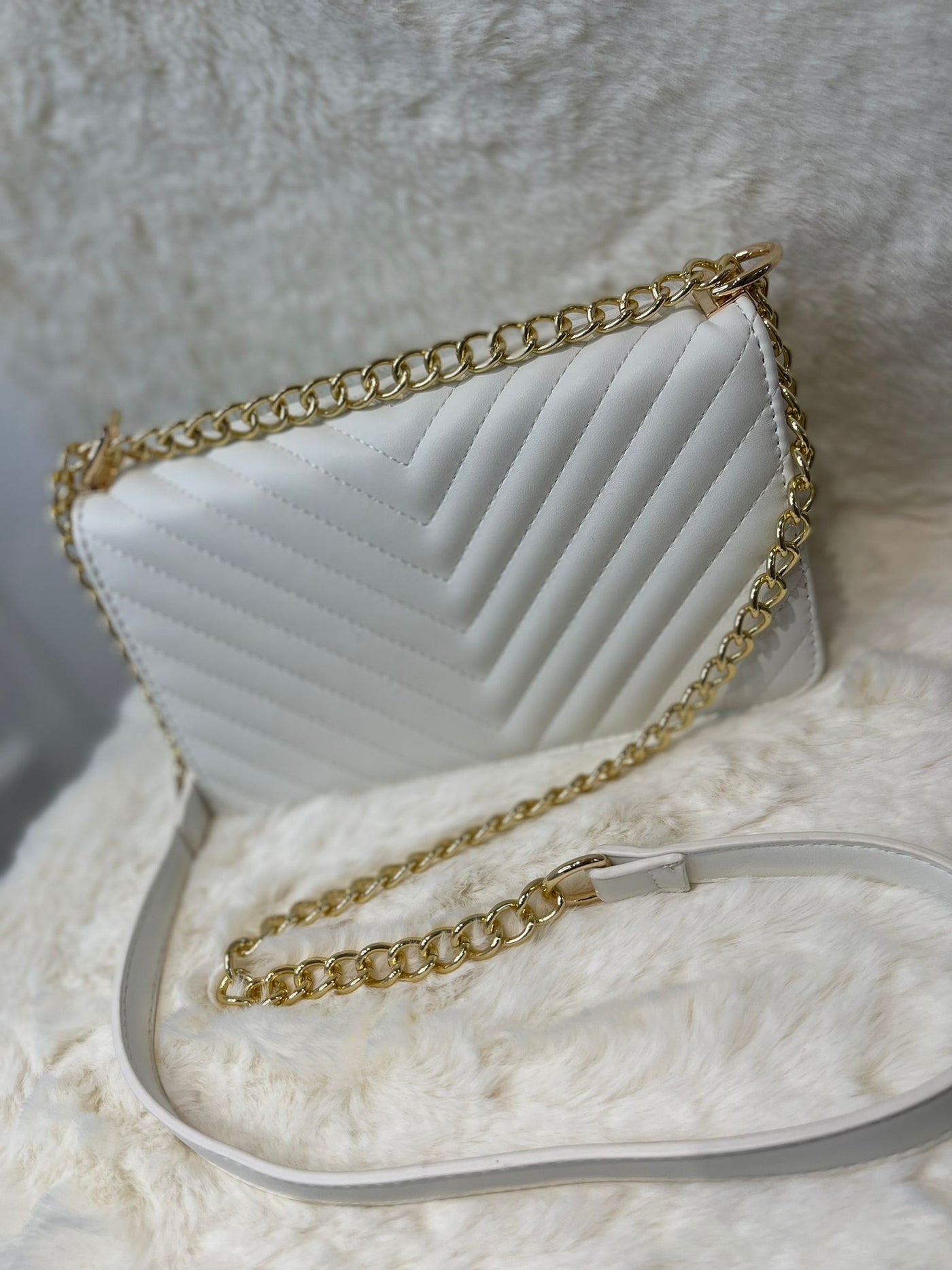 White stitch detail gold chain bag