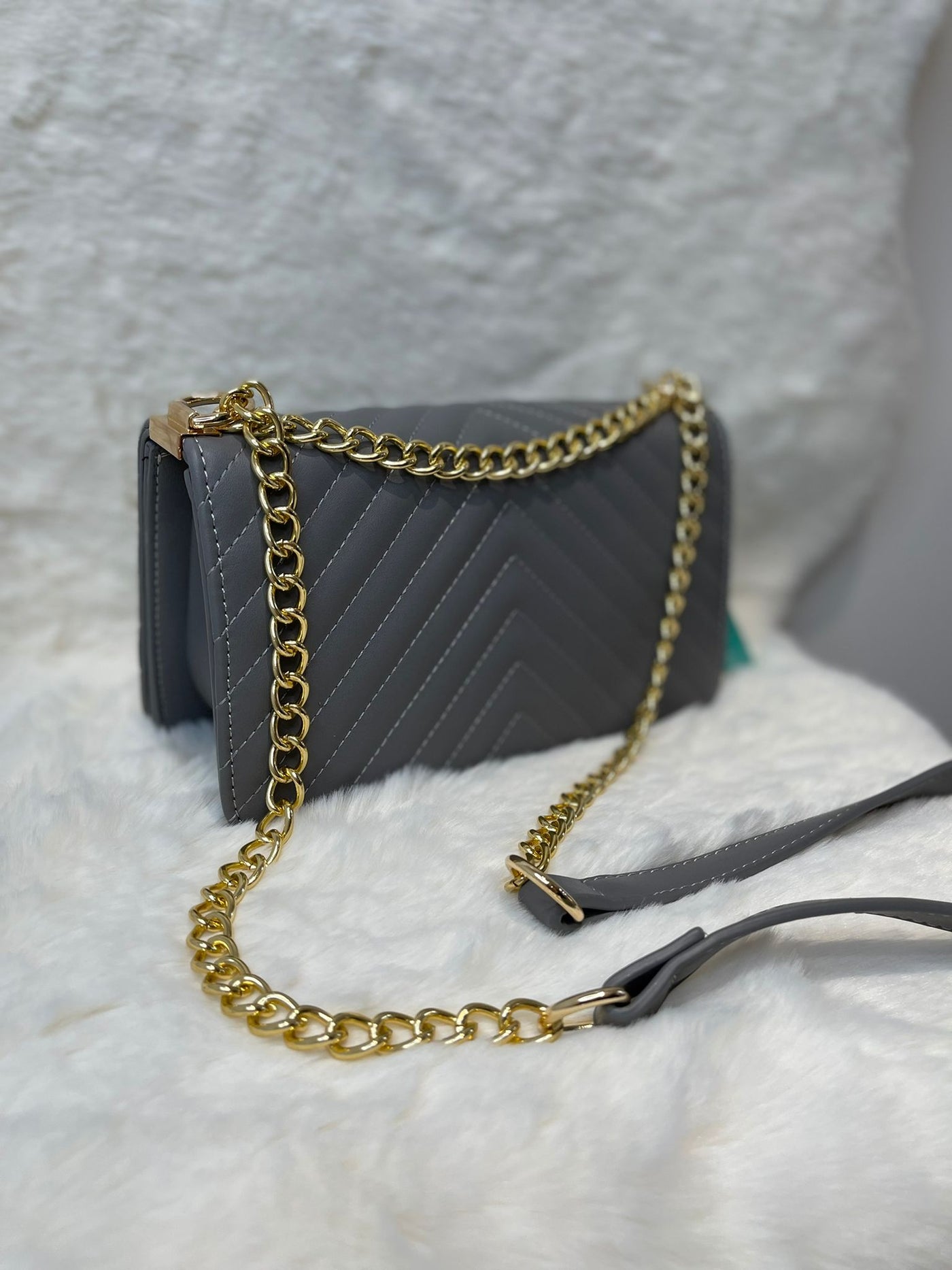 Grey stitch detail gold chain bag