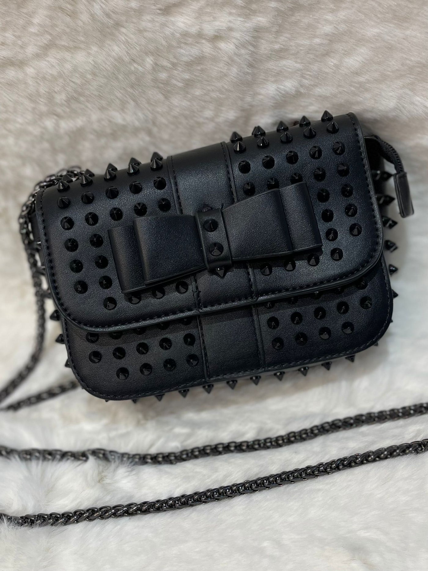 Black out studded bow detail cross body bag